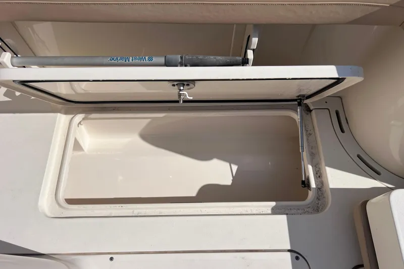 Slide: The Image of Open hatch on 2019 Scout 275 LXF boat, featuring West Marine hardware. - 72