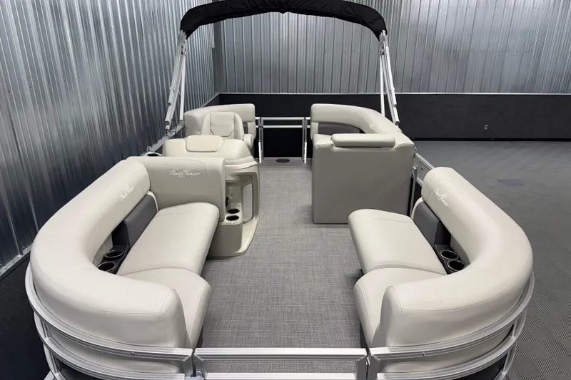 Slide: The Image of 2026 SunChaser Vista 18 LR pontoon boat interior with plush seating and modern design. - 1