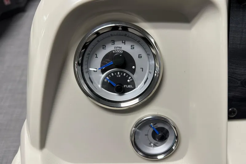 Slide: The Image of Dashboard of 2026 SunChaser Vista 18 LR with RPM and fuel gauges. - 11