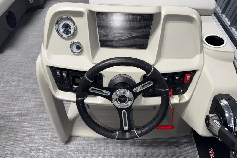 Slide: The Image of Steering console of 2026 SunChaser Vista 18 LR pontoon boat, featuring modern controls and gauges. - 8