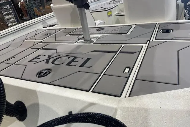 Slide: The Image of 2026 Excel EX 183 boat deck with sleek design and modern features. - 11