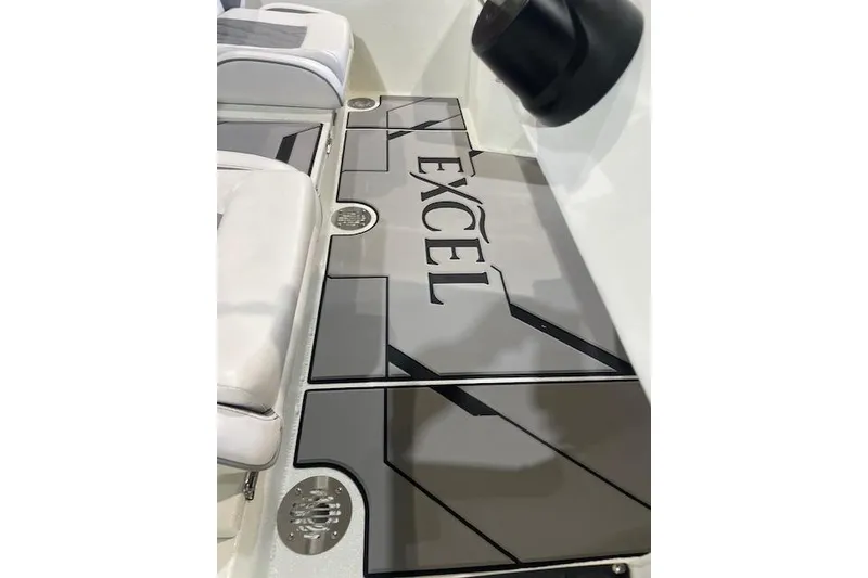 Slide: The Image of 2026 Excel EX 183 boat interior with sleek seating and modern design elements. - 8
