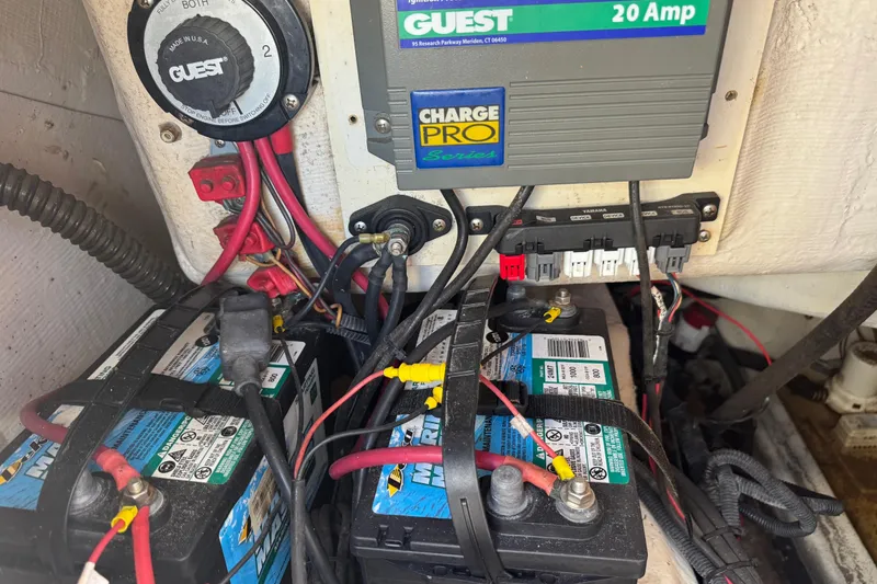 Slide: The Image of Electrical system of a 2007 Cobia 237 Center Console boat with batteries and wiring. - 20