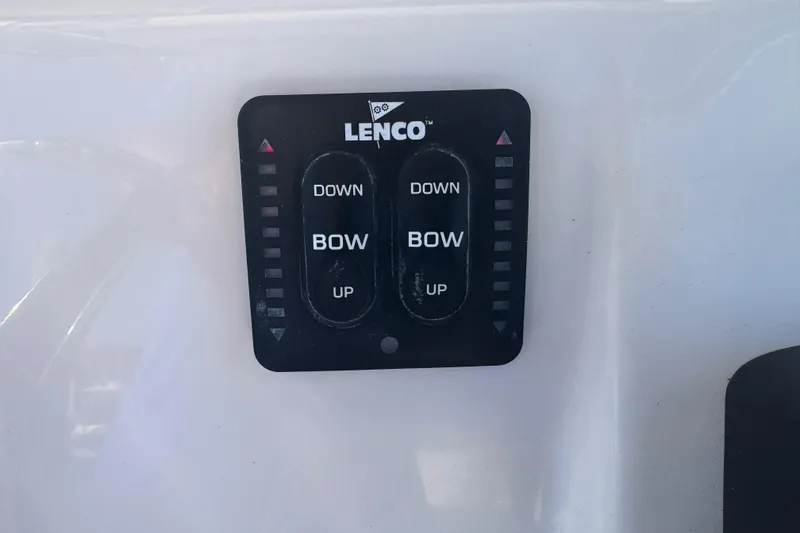 Slide: The Image of Lenco trim tab control on 2007 Cobia 237 Center Console boat. - 7