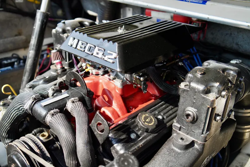 Slide: The Image of Engine of a 1995 Sea Ray 200 Bow Rider boat, featuring a Mec 6.2. - 23
