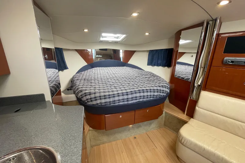 Slide: The Image of Interior of 2011 Formula 34 Performance Cruiser with cozy bed and modern amenities. - 23