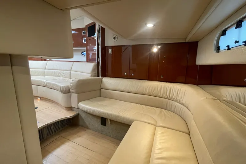 Slide: The Image of Luxurious interior of 2011 Formula 34 Performance Cruiser with beige leather seating. - 31