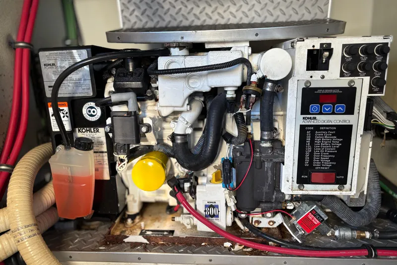 Slide: The Image of Engine compartment of a 2011 Formula 34 Performance Cruiser with Kohler power system. - 43