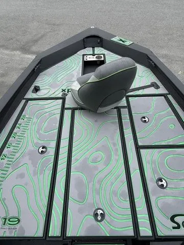 Slide: The Image of 2023 Xpress Boats X19 PRO deck with stylish green and gray design. - 9