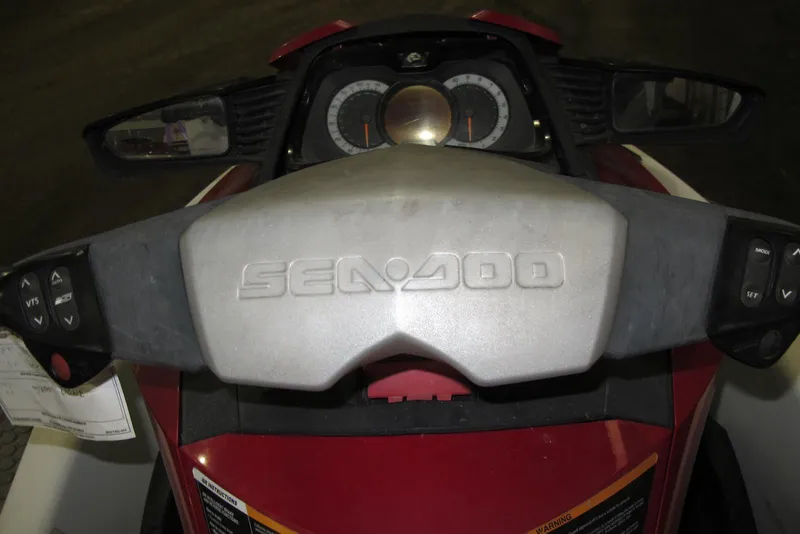 Slide: The Image of 2011 Sea-Doo GTX 155 dashboard with controls and speedometer. - 4