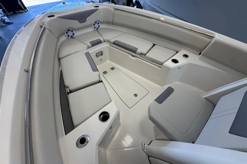 Slide: The Image of Interior view of 2026 Sailfish 232 CC boat, featuring spacious seating and modern design. - 10