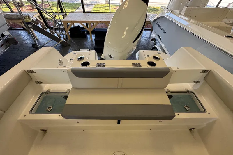 Slide: The Image of 2026 Sailfish 232 CC boat interior with seating and storage compartments. - 3