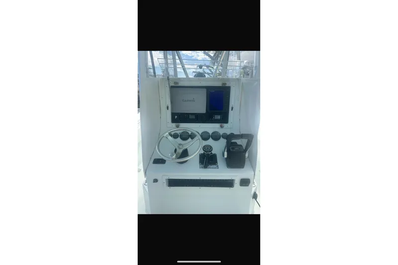 Slide: The Image of Electrical system of a 2003 Contender 27 Open boat with Garmin equipment. - 38