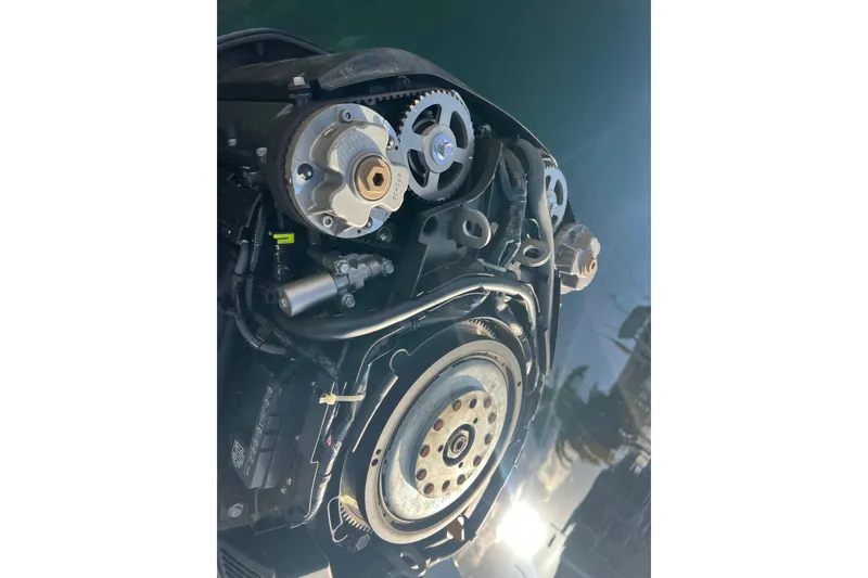 Slide: The Image of Close-up of a 2003 Contender 27 Open boat engine components. - 51