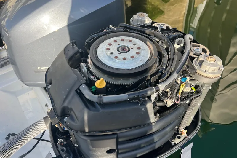 Slide: The Image of 2003 Contender 27 Open boat engine, detailed view of mechanical components. - 52