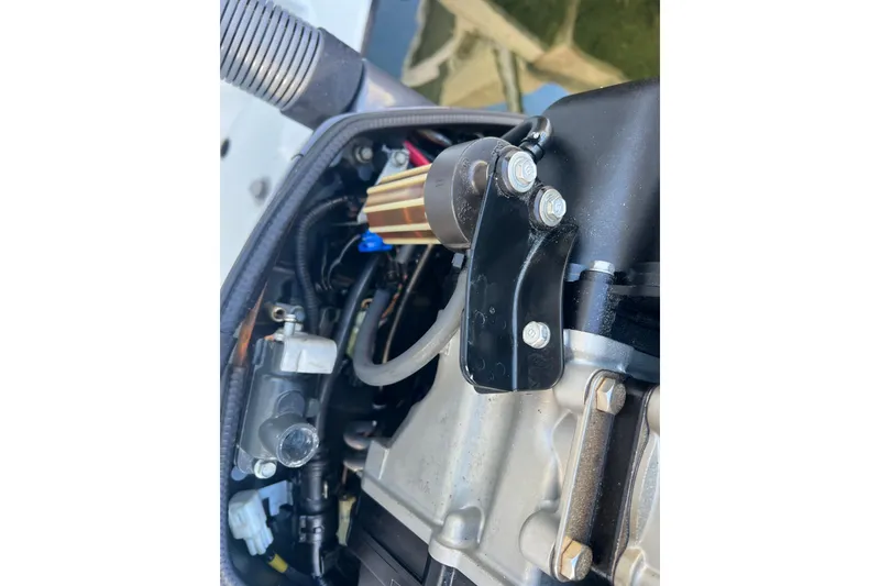 Slide: The Image of Close-up of a 2003 Contender 27 Open boat engine component. - 55
