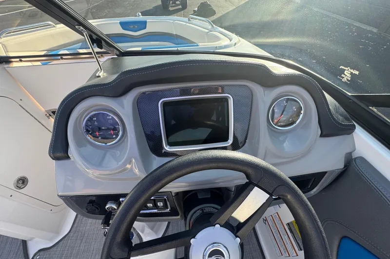 Slide: The Image of 2018 Chaparral Vortex 203 VRX dashboard with steering wheel and gauges. - 10