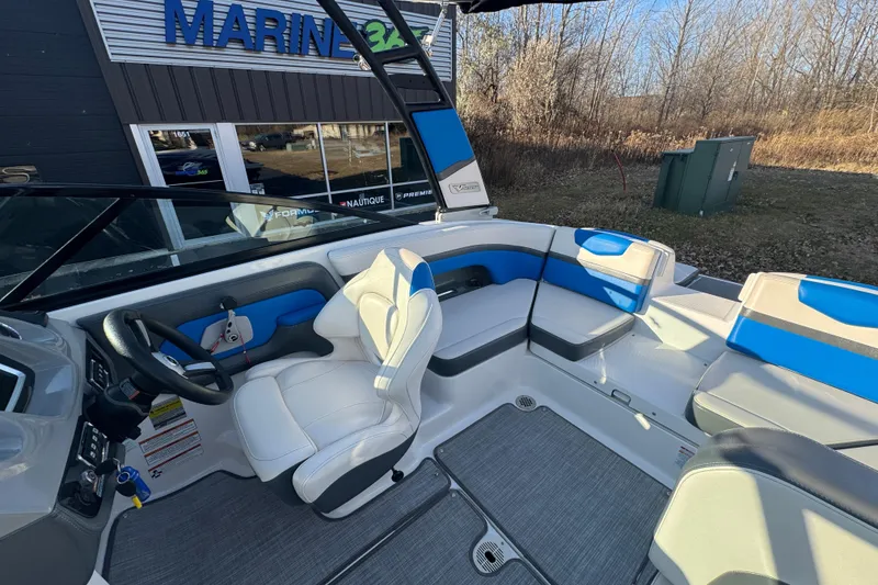 Slide: The Image of 2018 Chaparral Vortex 203 VRX boat interior with blue and white seating. - 13