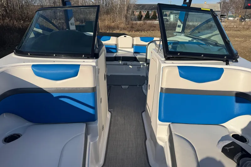 Slide: The Image of 2018 Chaparral Vortex 203 VRX boat interior with blue and white seating. - 19