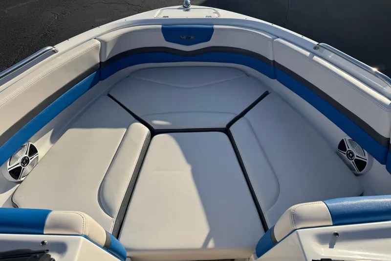 Slide: The Image of 2018 Chaparral Vortex 203 VRX boat interior with blue and white seating. - 21