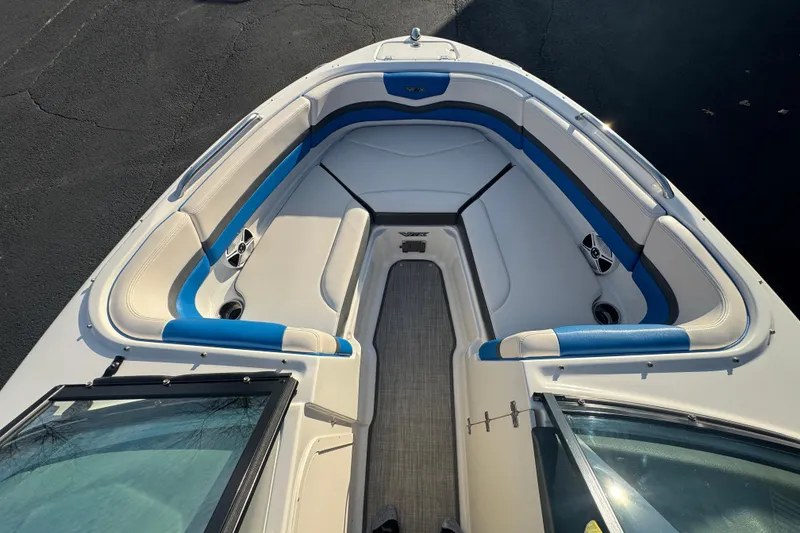 Slide: The Image of 2018 Chaparral Vortex 203 VRX boat interior with blue and white seating. - 27