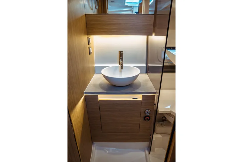 Slide: The Image of 2025 Jeanneau Leader 10.5 WA Series 2 cabin interior with wooden finish and modern design. - 40