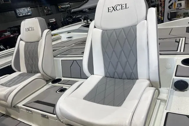 Slide: The Image of 2026 Excel 183C boat seats with gray and white diamond-pattern upholstery. - 4