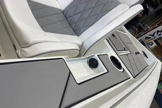 Slide: The Image of Luxurious seating on 2026 Excel 183C boat with sleek gray and white design. - 6