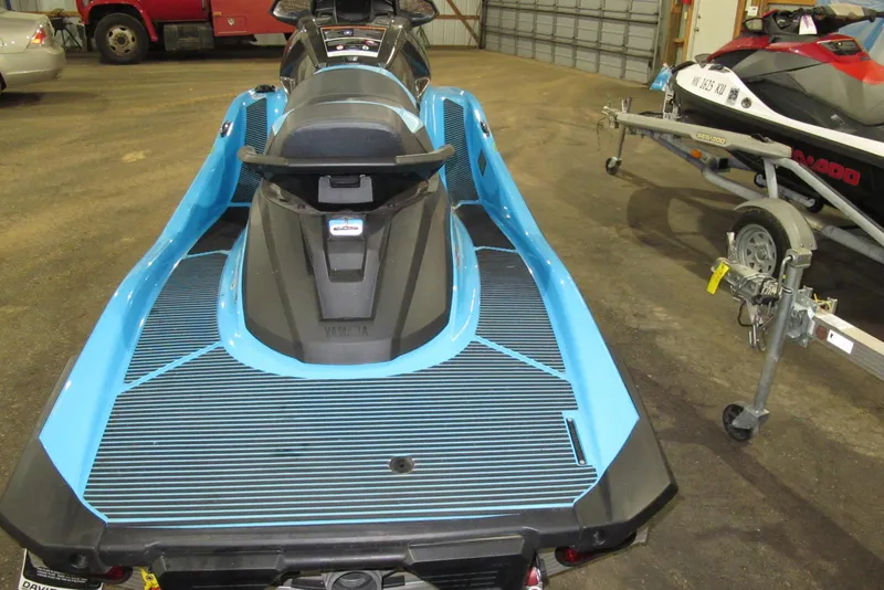 Slide: The Image of 2022 Yamaha WaveRunner VX Cruiser in a garage, showcasing its sleek blue design. - 2