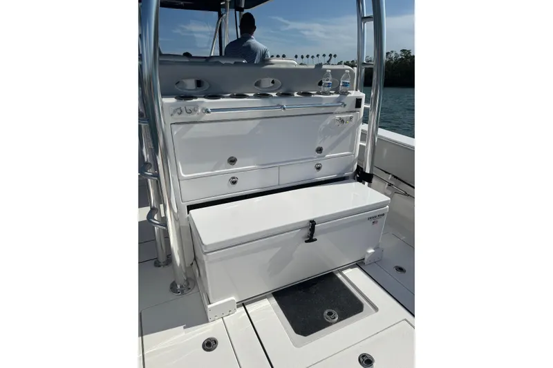 Slide: The Image of 2025 Contender 39 ST boat interior with storage compartments and seating. - 10
