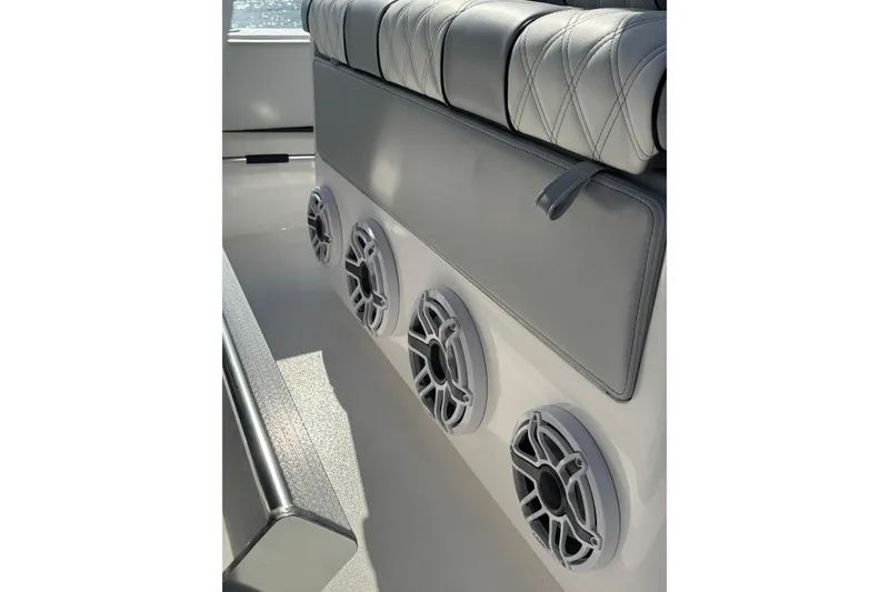Slide: The Image of 2025 Contender 39 ST boat interior with premium seating and integrated speakers. - 11