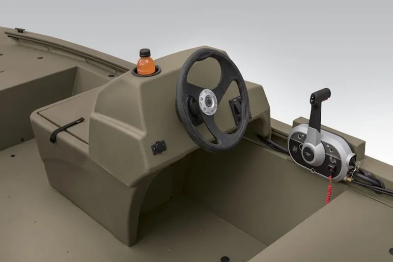 Slide: The Image of 2026 Tracker Grizzly 1648 S boat console with steering wheel and throttle control. - 3