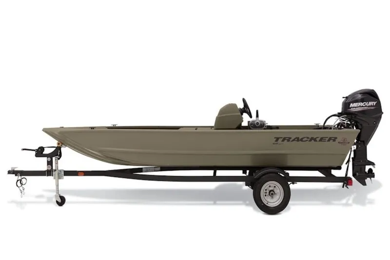 Slide: The Image of 2026 Tracker Grizzly 1648 S boat on trailer, side view, with Mercury outboard motor. - 7