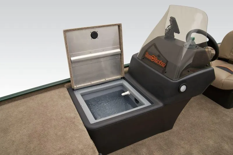 Slide: The Image of 2025 Tracker Bass Tracker Classic Limited boat interior with open livewell and steering console. - 20
