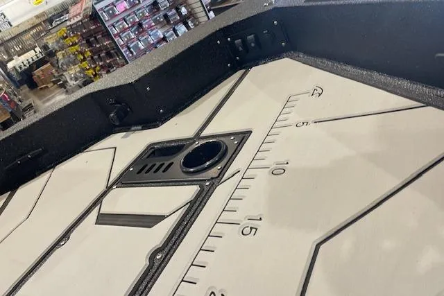 Slide: The Image of Fishing boat deck with measurement markings, Excel EX203, 2026 model, in a store display. - 9