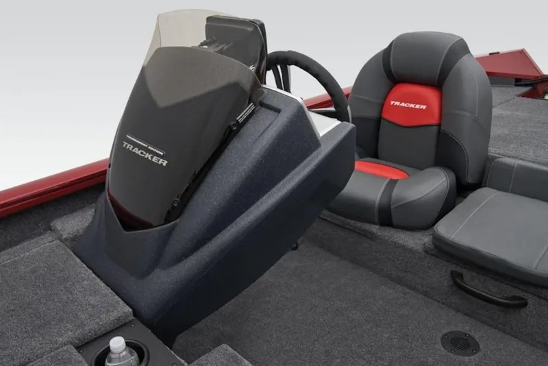 Slide: The Image of 2026 Tracker Pro Team 175 TXW boat interior with steering console and seating. - 11