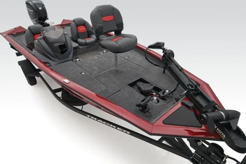 Slide: The Image of 2026 Tracker Pro Team 175 TXW fishing boat, red exterior, equipped with seating and motor. - 4