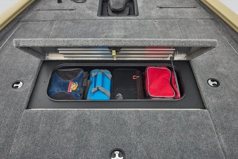 Slide: The Image of Storage compartment of 2026 Tracker Pro Team 195 boat with organized gear bags. - 3