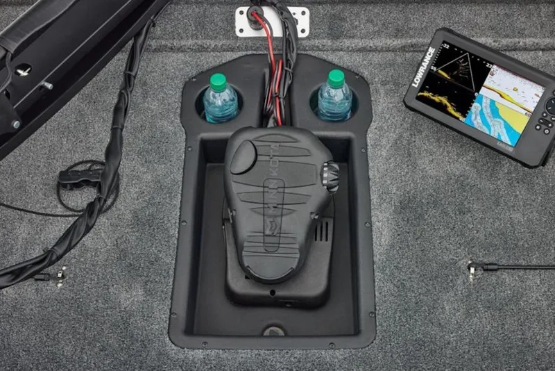 Slide: The Image of 2026 Tracker Pro Team 195 boat interior with fishfinder and storage compartments. - 7