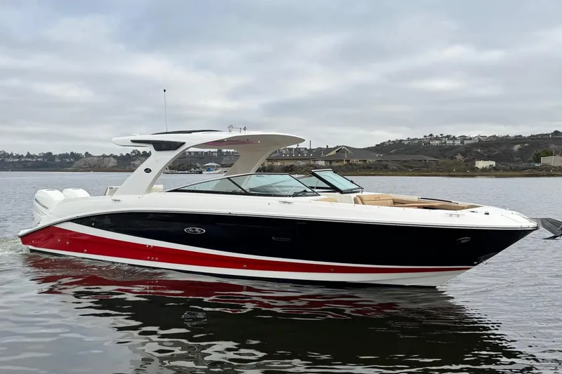 Slide: The Image of 2023 Sea Ray SLX 350 boat on calm water, featuring sleek design and vibrant colors. - 2