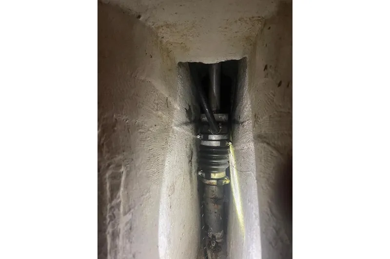 Slide: The Image of Close-up of mechanical components inside a 1994 Island Packet 44 cutter sailboat. - 118