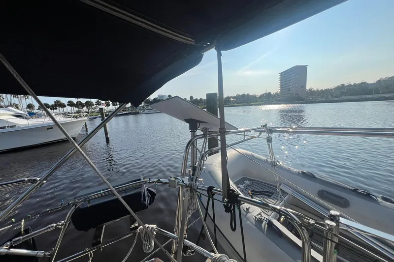 Slide: The Image of Sailboat docked in marina, Island Packet 44 cutter, 1994 model, sunny day. - 15