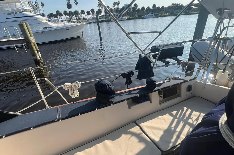 Slide: The Image of Cockpit view of 1994 Island Packet 44 cutter sailboat docked at marina. - 25