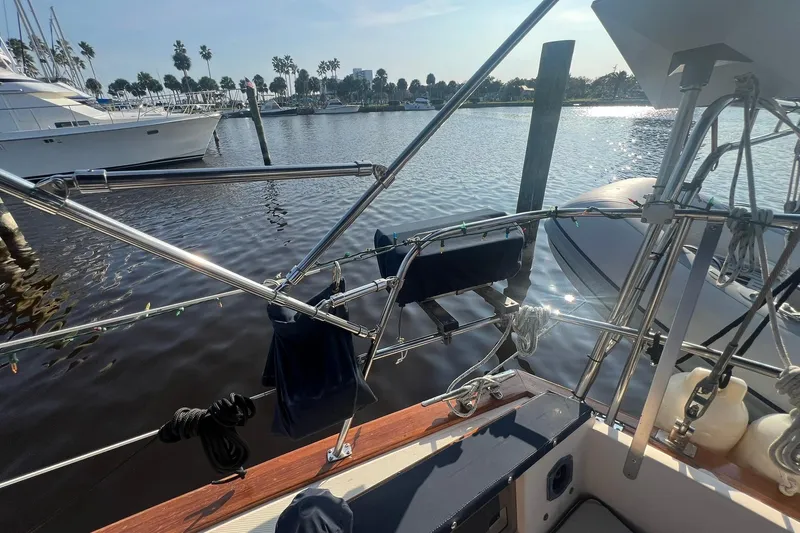 Slide: The Image of Island Packet 44 cutter sailboat docked at marina, sunny day, 1994 model. - 42