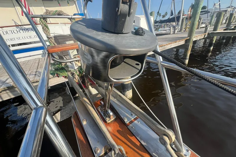 Slide: The Image of Bow of a 1994 Island Packet 44 cutter docked at a marina. - 57