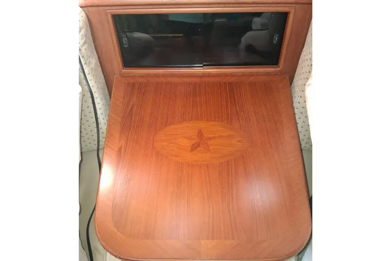 Slide: The Image of Wooden table with star inlay on 1994 Island Packet 44 cutter yacht. - 72