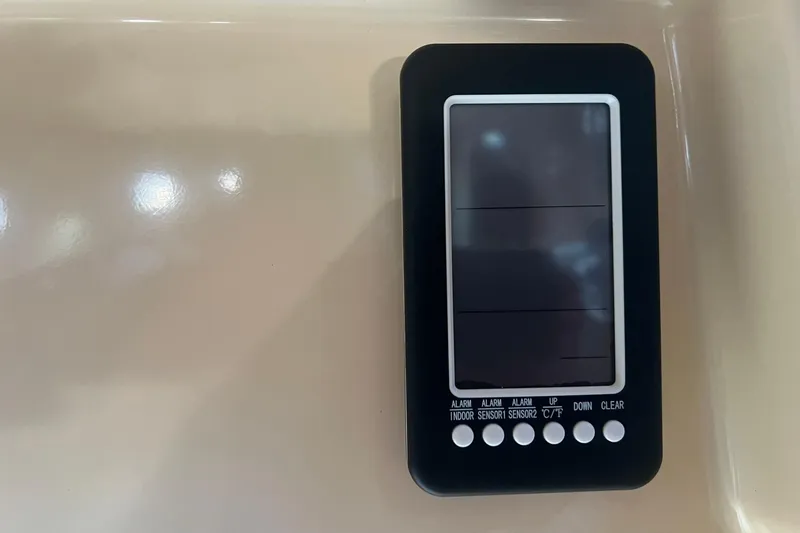 Slide: The Image of Digital control panel on 1994 Island Packet 44 cutter yacht, featuring multiple buttons. - 82