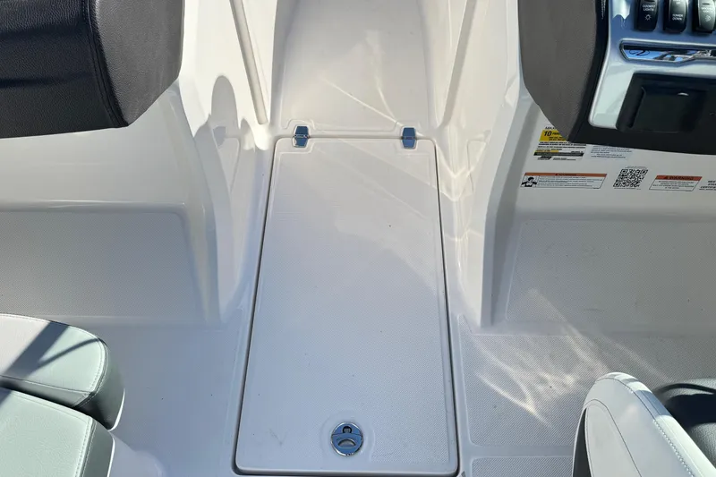 Slide: The Image of 2026 Regal 21 OBX boat interior with seating and control panel. - 40