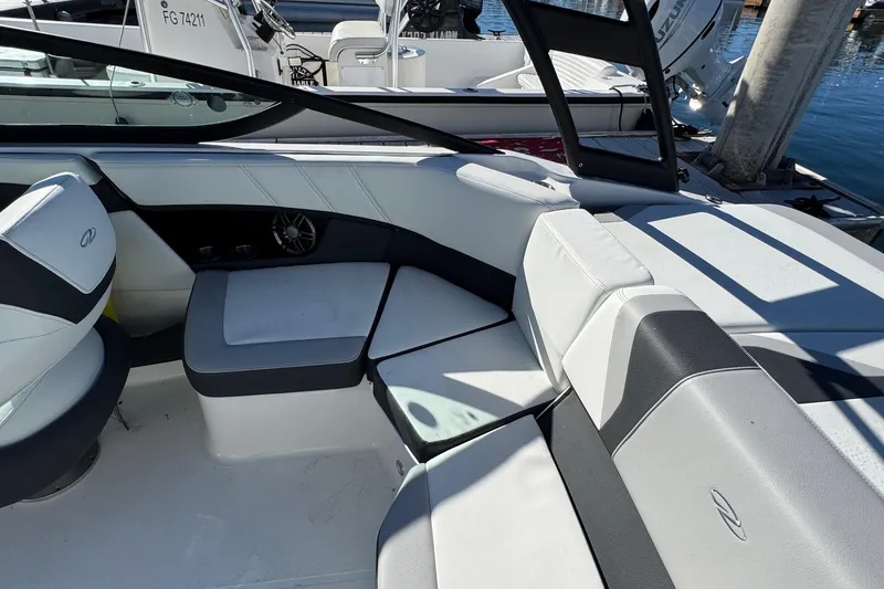 Slide: The Image of Interior seating of 2026 Regal 21 OBX boat, featuring modern design and comfortable upholstery. - 54