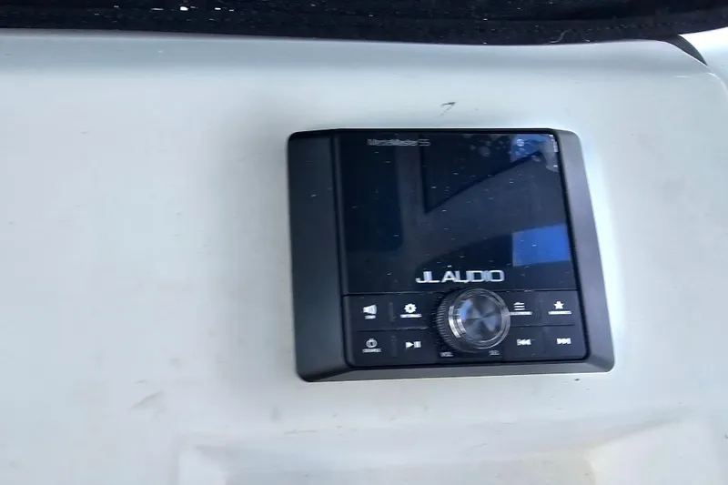 Slide: The Image of JL Audio system on 2021 Sportsman Masters 267OE Bay Boat dashboard. - 19